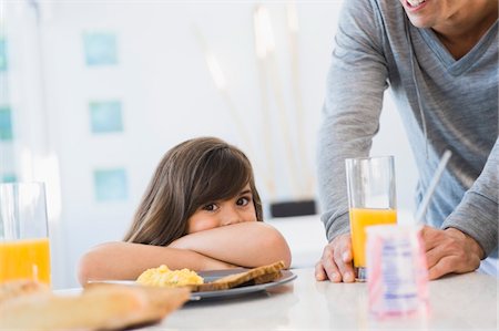 simsearch:6108-05864945,k - Girl with her father at the breakfast table Stock Photo - Premium Royalty-Free, Code: 6108-05873899