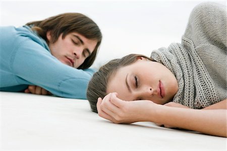 separate - Couple resting on the floor Stock Photo - Premium Royalty-Free, Code: 6108-05874277