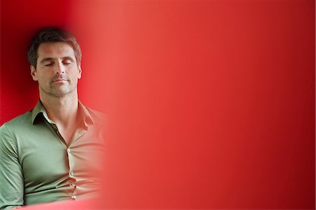 person in office cubicle - Man sitting with eyes closed Stock Photo - Premium Royalty-Free, Code: 6108-06165974