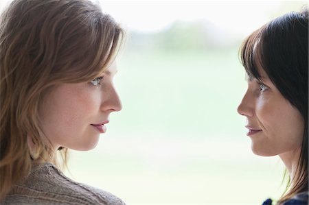Woman and her mother face to face Stock Photo - Premium Royalty-Free, Code: 6108-06166333