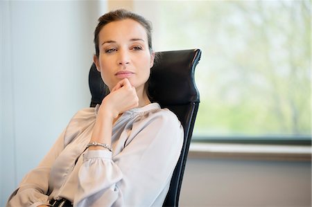 simsearch:6108-06167824,k - Close-up of a businesswoman thinking in an office Stock Photo - Premium Royalty-Free, Code: 6108-06167805