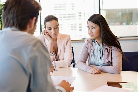 formed - Business executive discussing with his clients Stock Photo - Premium Royalty-Free, Code: 6108-06167966