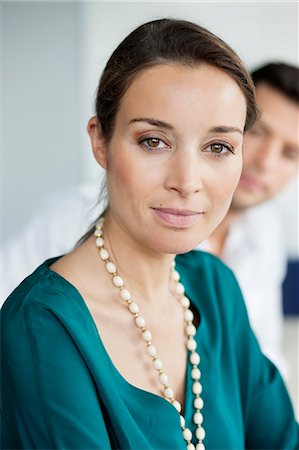simsearch:6108-06167827,k - Portrait of a businesswoman in an office Stock Photo - Premium Royalty-Free, Code: 6108-06168019