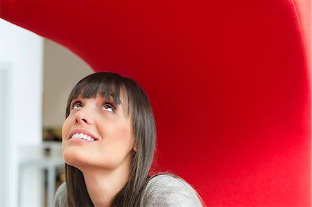 positive thought - Close-up of a businesswoman day dreaming Stock Photo - Premium Royalty-Free, Code: 6108-06168357