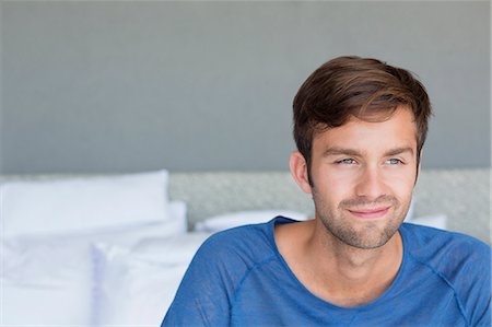 Close-up of a man smiling Stock Photo - Premium Royalty-Free, Code: 6108-06904571