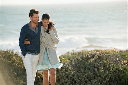 simsearch:6108-06907503,k - Couple walking on the beach Stock Photo - Premium Royalty-Free, Code: 6108-06905479