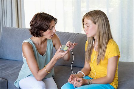 Woman talking to her daughter Stock Photo - Premium Royalty-Free, Code: 6108-06905581