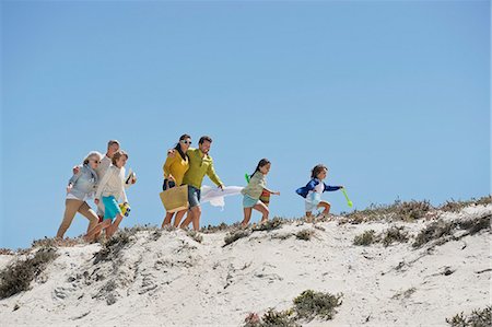 family hill - Family walking on the beach Stock Photo - Premium Royalty-Free, Code: 6108-06905941