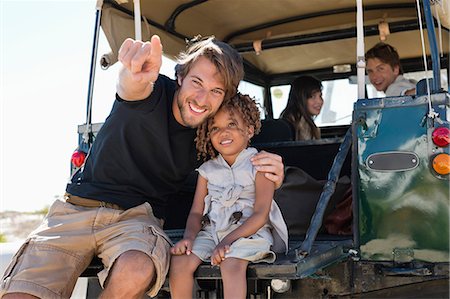 safari - Family traveling in a SUV Stock Photo - Premium Royalty-Free, Code: 6108-06906297