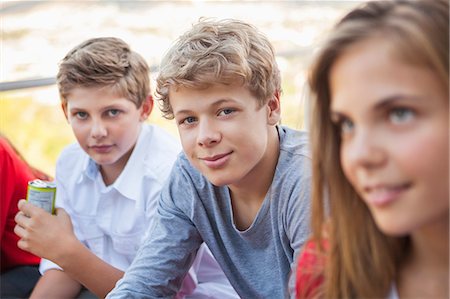 preadolescent boy - Friends smiling together Stock Photo - Premium Royalty-Free, Code: 6108-06907009