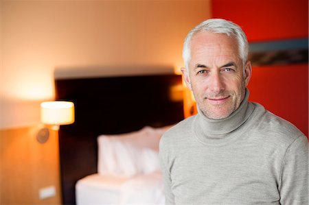 simsearch:6108-06907153,k - Portrait of a man in a hotel room Stock Photo - Premium Royalty-Free, Code: 6108-06907178