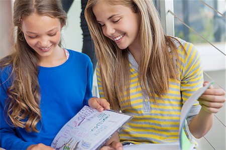 simsearch:6108-06907045,k - Two girls studying in a school Stock Photo - Premium Royalty-Free, Code: 6108-06907700