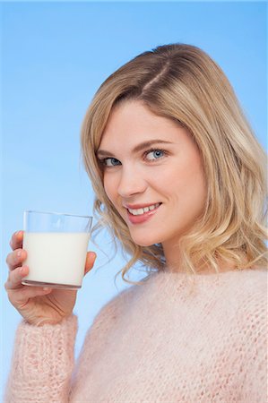 simsearch:6108-07969525,k - Close-up of a woman drinking milk Stock Photo - Premium Royalty-Free, Code: 6108-07969566