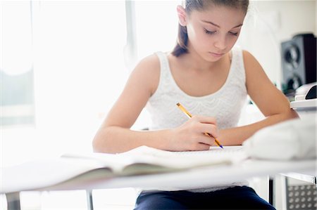 simsearch:6108-07969525,k - Girl studying at home Stock Photo - Premium Royalty-Free, Code: 6108-07969504