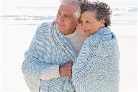 simsearch:649-07520161,k - Old couple embracing each other on the beach Stock Photo - Premium Royalty-Free, Code: 6108-08663045
