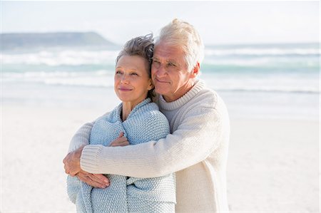 simsearch:649-07520161,k - Elderly man embracing his wife from behind on the beach Stock Photo - Premium Royalty-Free, Code: 6108-08663054