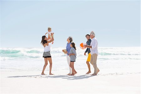 simsearch:614-06002173,k - Multi-generation family walking on the beach Stock Photo - Premium Royalty-Free, Code: 6108-08663075