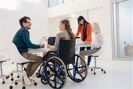 disabled - Business team working in an office Stock Photo - Premium Royalty-Free, Code: 6108-08725322