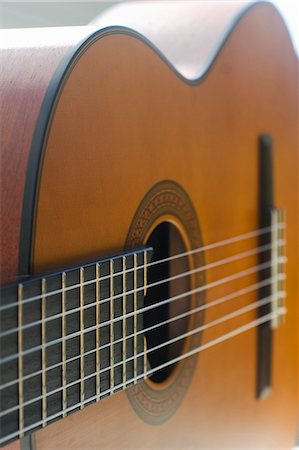 simsearch:6102-03748485,k - Close-up on a classical guitar. Stock Photo - Premium Royalty-Free, Code: 6108-08943430