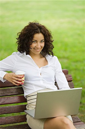 simsearch:614-09078761,k - Businesswoman sitting in a bench in a Park in the pause from work Stock Photo - Premium Royalty-Free, Code: 6108-08908997