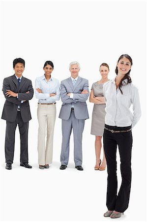 simsearch:6109-06002816,k - Smiling business team with a woman's hands behind her back in foreground Stock Photo - Premium Royalty-Free, Code: 6109-06002686