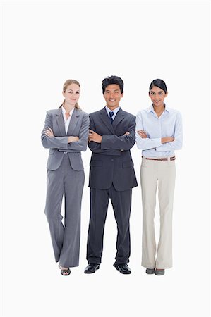simsearch:6109-06002816,k - Smiling business people with their arms folded against white background Stock Photo - Premium Royalty-Free, Code: 6109-06002857