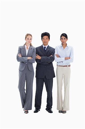 Business people with their arms folded against white background Stock Photo - Premium Royalty-Free, Code: 6109-06002858