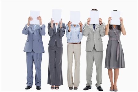 stand - Five business people hiding their faces behind small white placards against white background Stock Photo - Premium Royalty-Free, Code: 6109-06002829