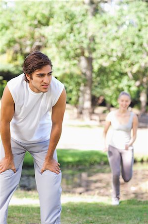 fitness man exhausting - Exhausted young sportsman waiting for his partner Stock Photo - Premium Royalty-Free, Code: 6109-06004538