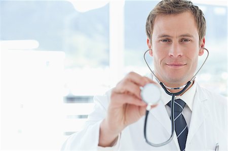 simsearch:6109-06005907,k - Doctor with his stethoscope Stock Photo - Premium Royalty-Free, Code: 6109-06005890