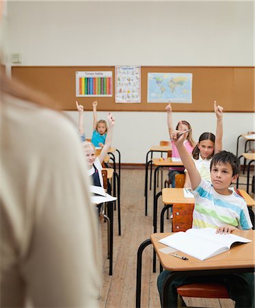 simsearch:6109-06007455,k - Students with their hands raised in class Stock Photo - Premium Royalty-Free, Code: 6109-06007445