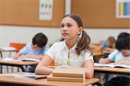 simsearch:6109-06007455,k - Elementary student looking to the blackboard Stock Photo - Premium Royalty-Free, Code: 6109-06007456
