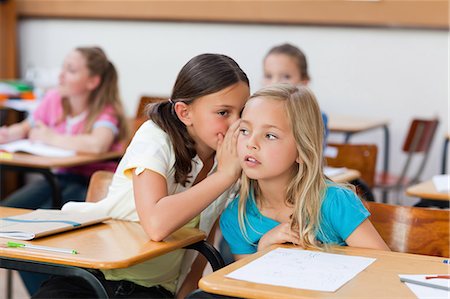 Little girls talking in class Stock Photo - Premium Royalty-Free, Code: 6109-06007495