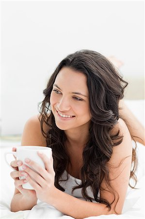 Pretty brunette with a cup of coffee Stock Photo - Premium Royalty-Free, Code: 6109-06194384