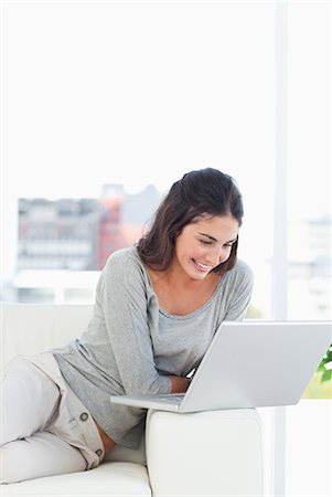 person in room - Young woman on a video chat Stock Photo - Premium Royalty-Free, Code: 6109-06194751