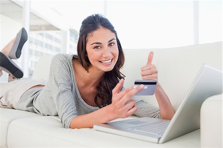 Student approving the shopping online Stock Photo - Premium Royalty-Free, Code: 6109-06194786