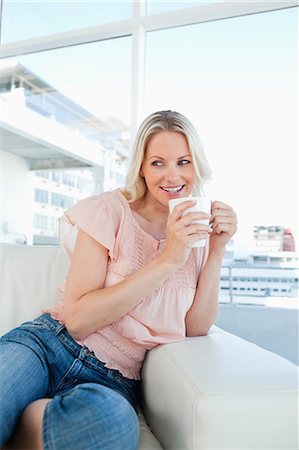 Happy blonde with a coffee Stock Photo - Premium Royalty-Free, Code: 6109-06195064