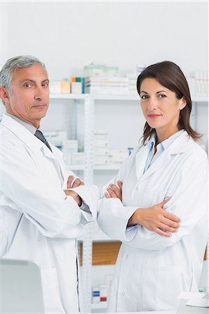 Pharmacists with their arms folded Stock Photo - Premium Royalty-Free, Code: 6109-06196137