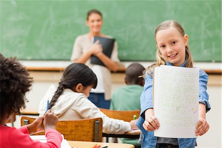 small child - Student showing her results Stock Photo - Premium Royalty-Free, Code: 6109-06196461