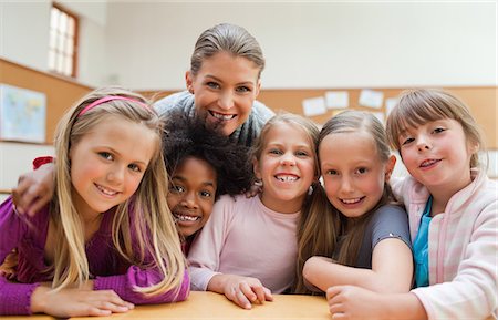 simsearch:6109-06196438,k - Girls with their teacher together Stock Photo - Premium Royalty-Free, Code: 6109-06196553