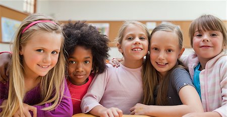 Girls standing together in class Stock Photo - Premium Royalty-Free, Code: 6109-06196552