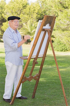 Old man painting outside using an easel Photographie de stock - Premium Libres de Droits, Code: 6109-06684853