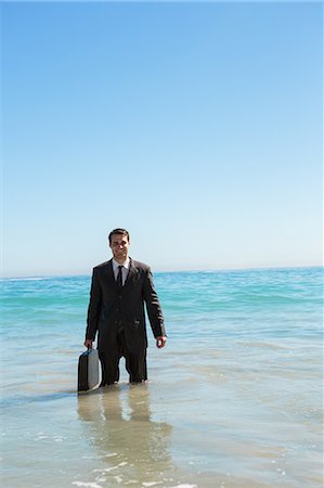 simsearch:6109-06684997,k - Handsome businessman in the sea Stock Photo - Premium Royalty-Free, Code: 6109-06781644