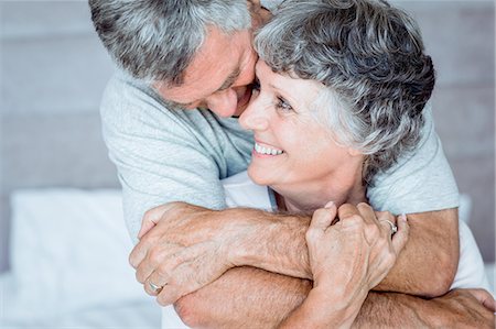 pyjama - Mature man cuddling his wife Stock Photo - Premium Royalty-Free, Code: 6109-06781889