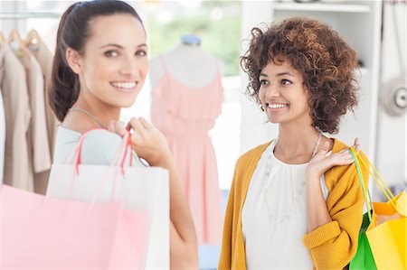 simsearch:693-06013903,k - Two attractive friends in a clothing store Stock Photo - Premium Royalty-Free, Code: 6109-06781935