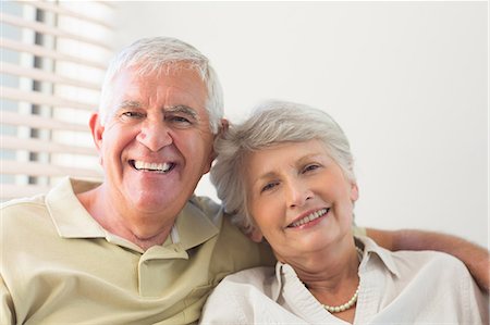 senior adult relaxing portrait not child - Senior couple smiling at the camera together Stock Photo - Premium Royalty-Free, Code: 6109-07601476