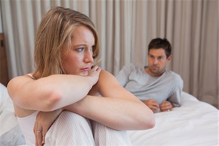 simsearch:6109-07601529,k - Couple not talking after an argument in bed Stock Photo - Premium Royalty-Free, Code: 6109-07601546