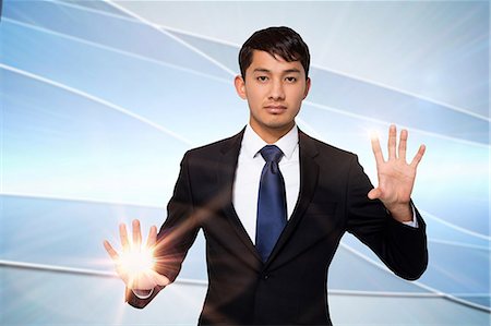 digitally generated image - Serious businessman touching lights Foto de stock - Sin royalties Premium, Código: 6109-07601596