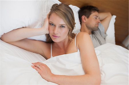 simsearch:632-01148228,k - Couple not talking after an argument in bed Stock Photo - Premium Royalty-Free, Code: 6109-07601526