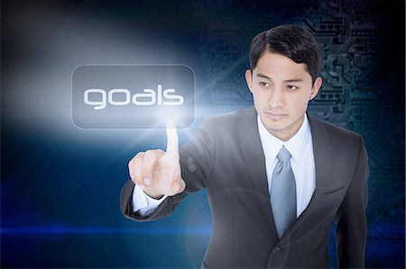 simsearch:614-02002647,k - Goals against futuristic background with circuit board Stock Photo - Premium Royalty-Free, Code: 6109-07601698